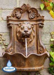 Fontana da muro classica completa con finitura effetto pietra e faccia di leone